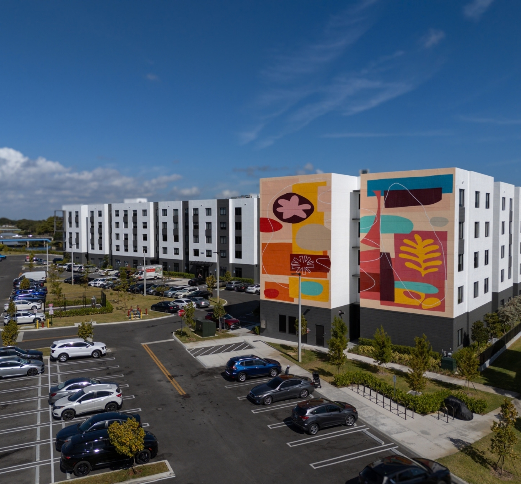 Exterior of Old Cutler Village Phase 2 featuring a large colorful mural