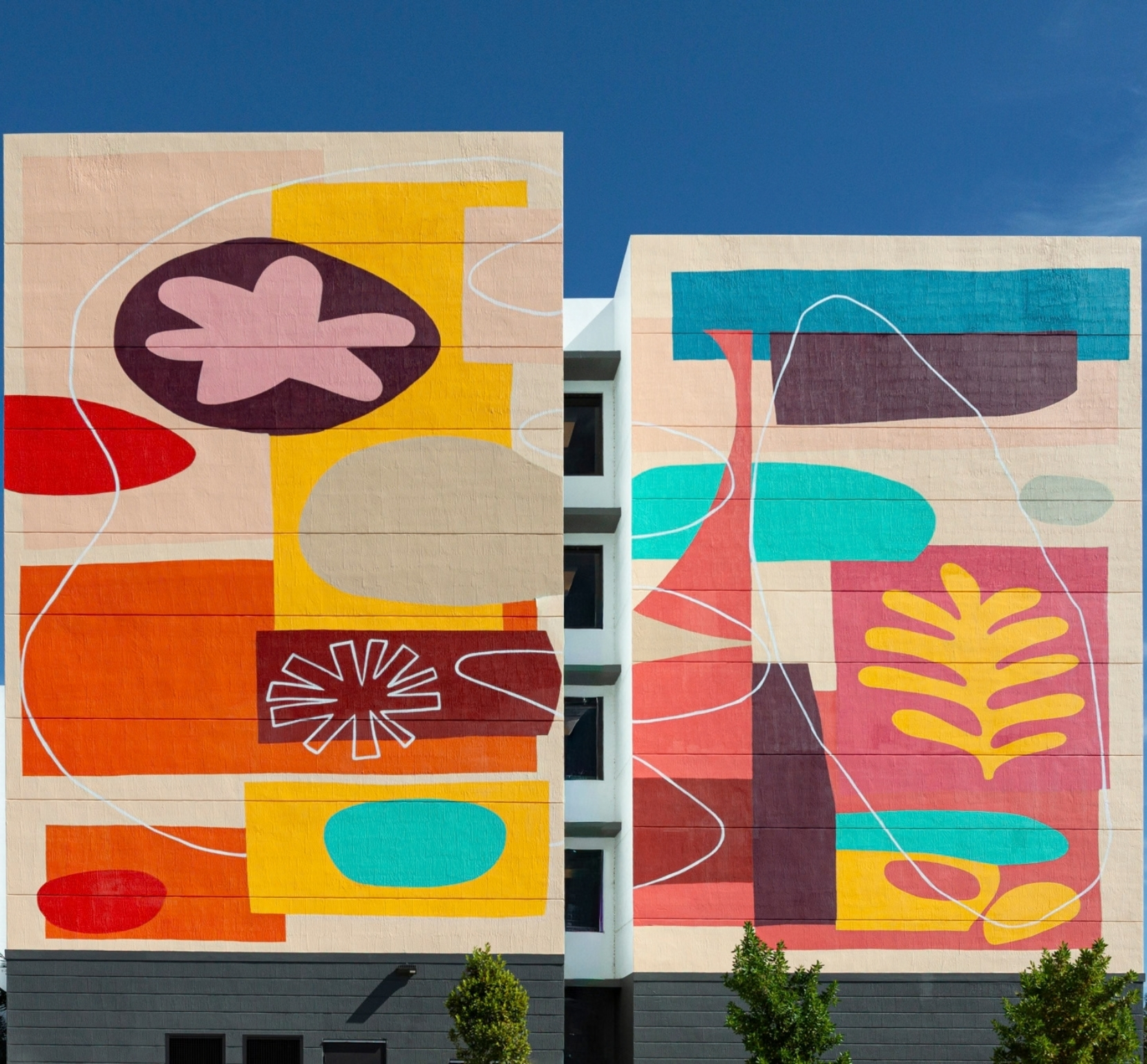 Colorful abstract mural on the exterior of Old Cutler Village Phase 2